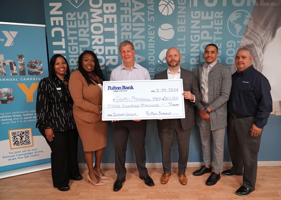 Savannah Horizon Bank presenting the Philadelphia YMCA with a donation check
